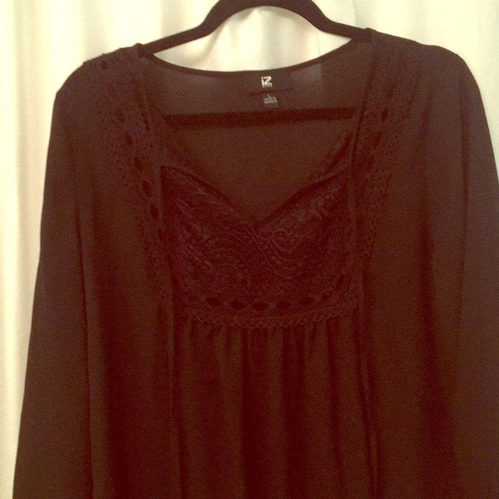 Flowy black sheer top, perfect for all occasions!